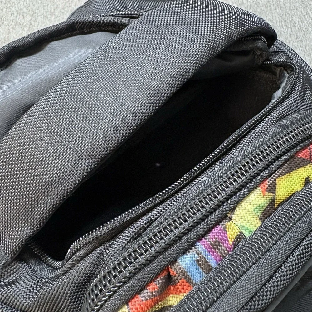 REIGN Total Body Fuel Backpack Black w/ Colorful Graffiti Accents‎ Multi Pocket